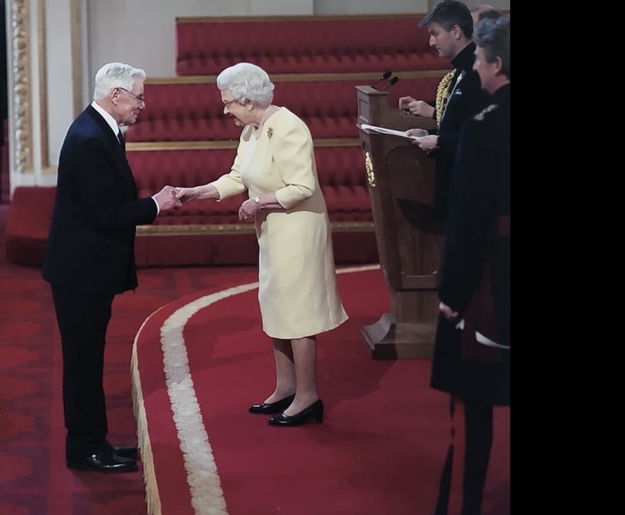 Gordon Knowles accepting his MBE from Queen Elizabeth II at Buckingham Palace in 2011.