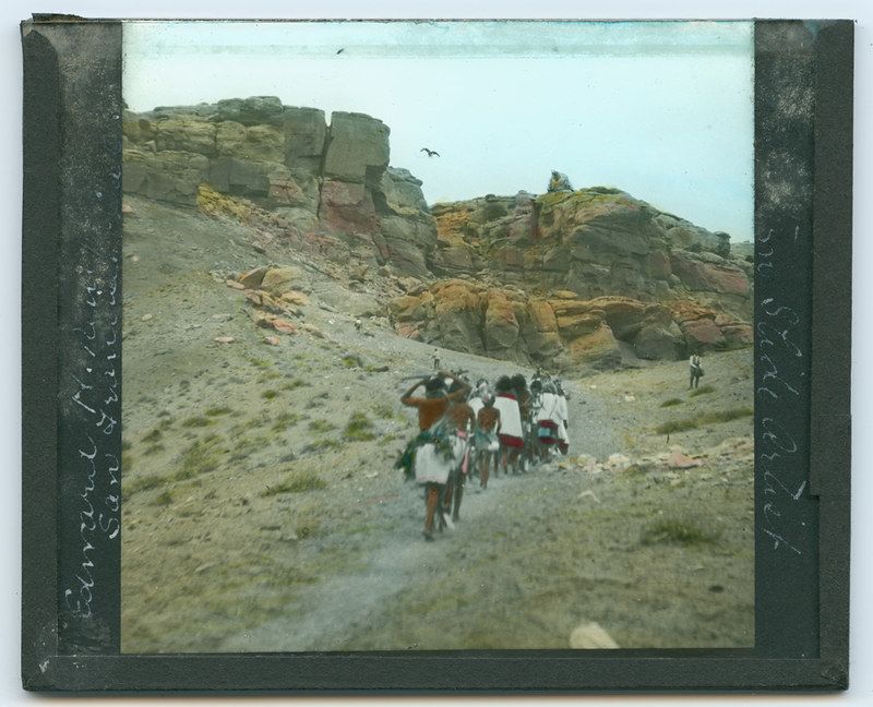 Native Americans Walking up Trail