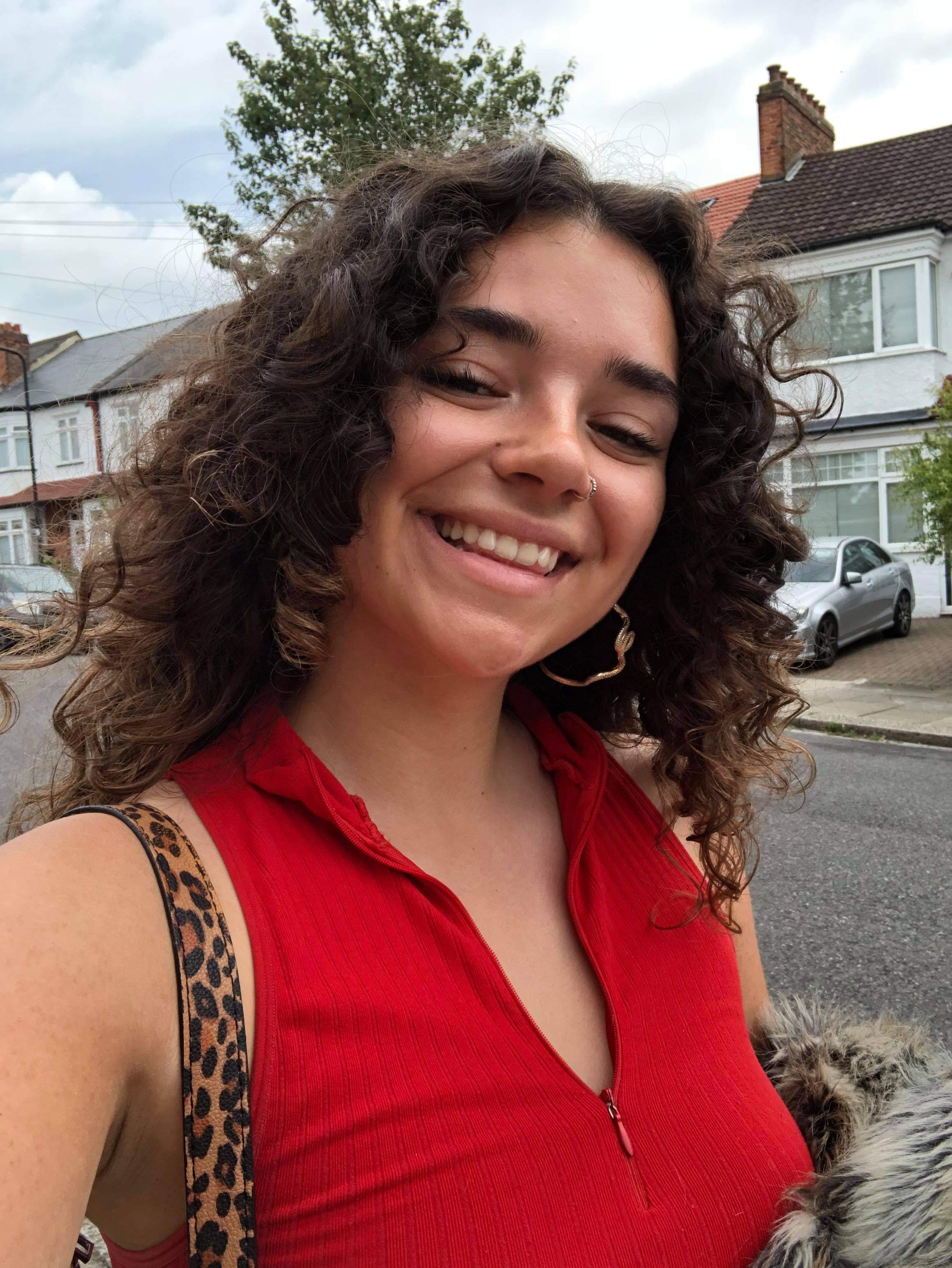 Picture of Alexandria: selfie wearing a red top