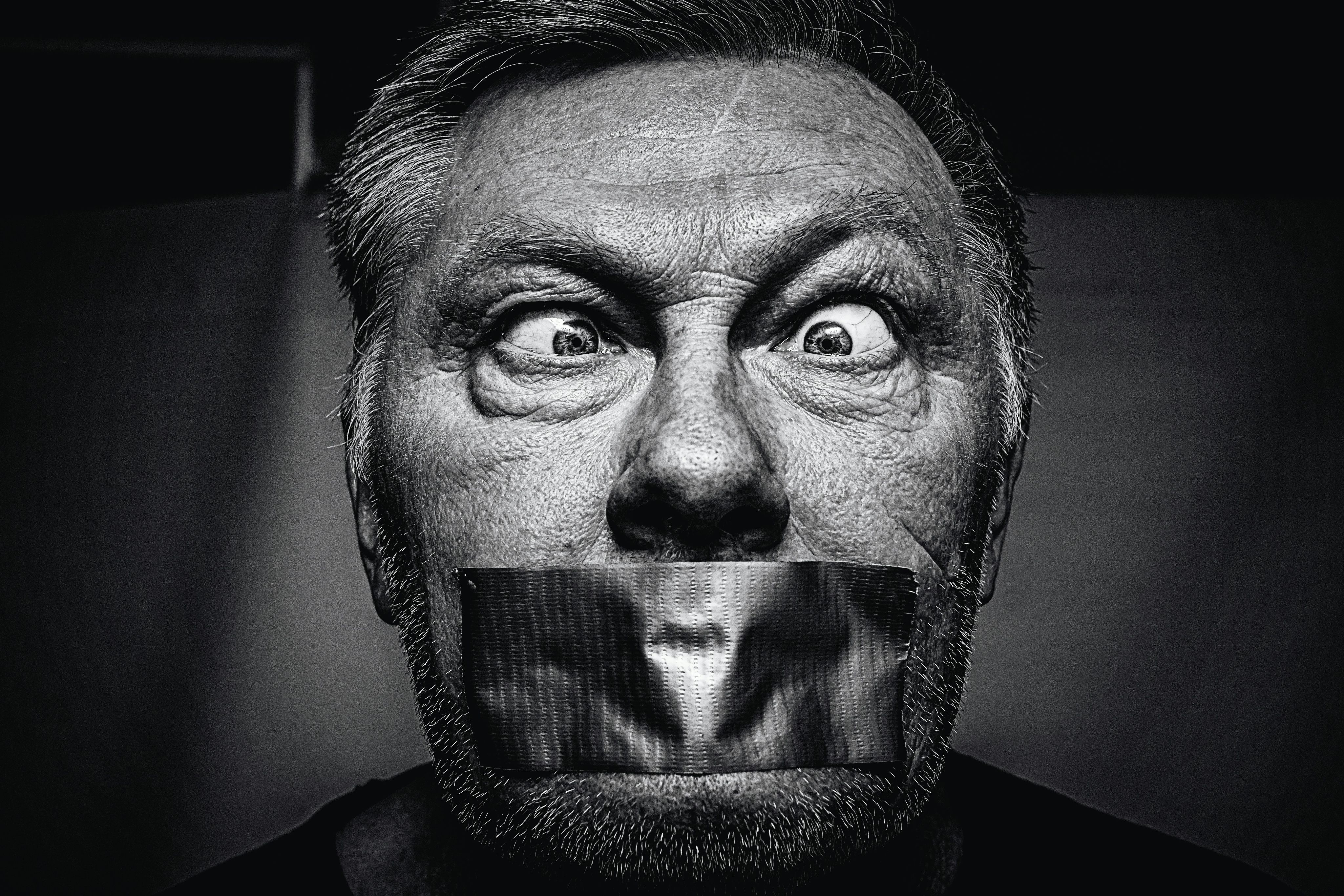 man on focus photography