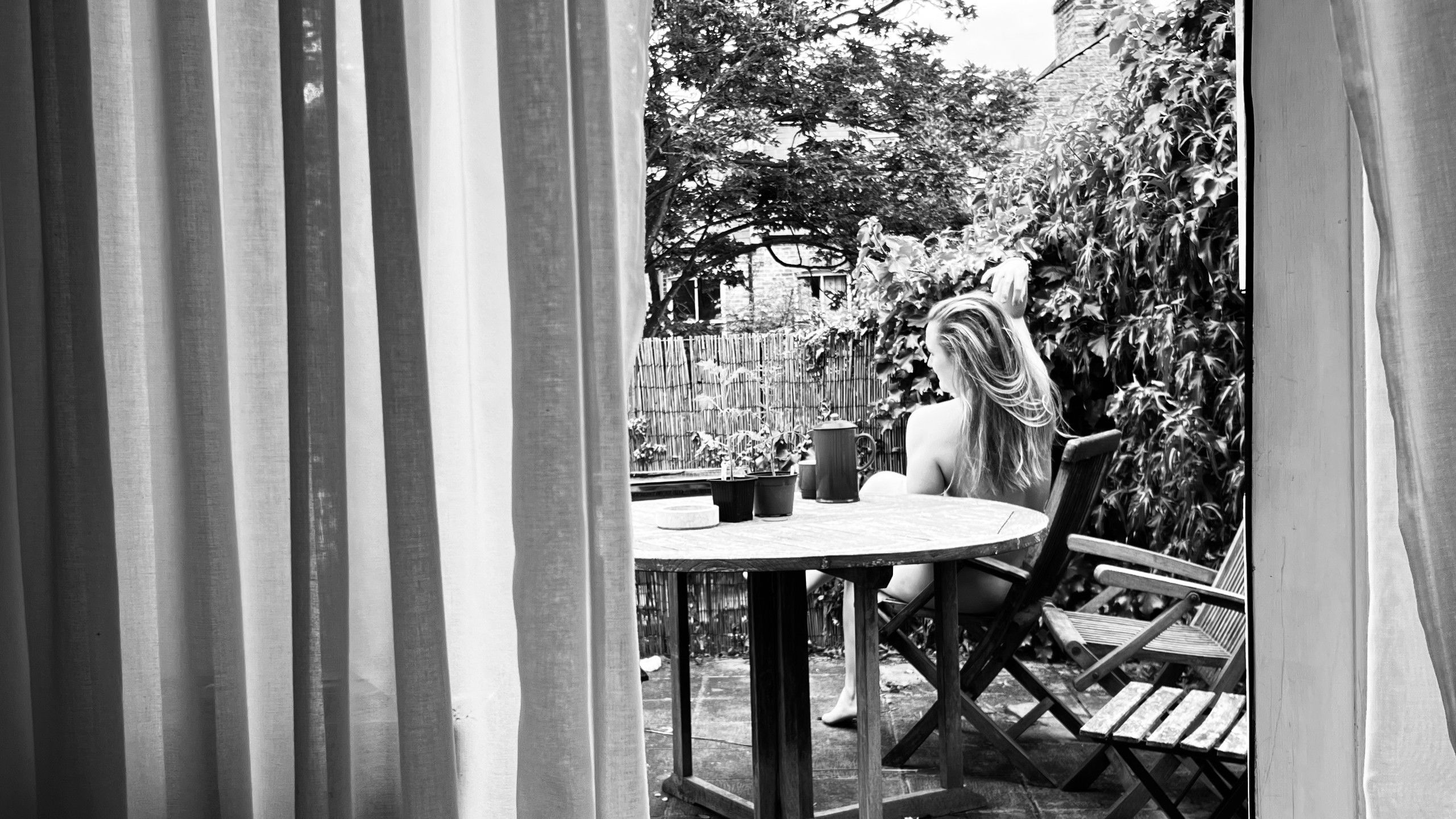 black and white naked woman outdoors