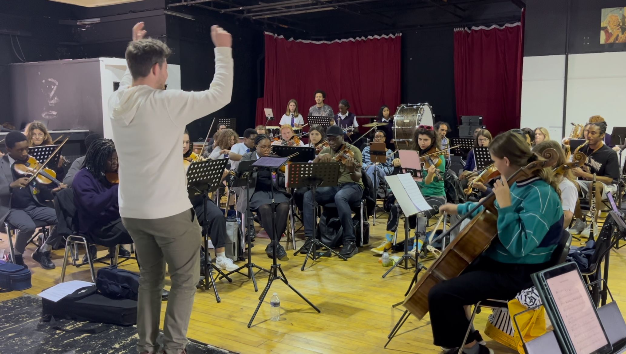 Matthew O'Keeffe conducting the BCO in rehearsal at St Matthew's Church, Brixton. (Picture credit: Charlotte Wilson)