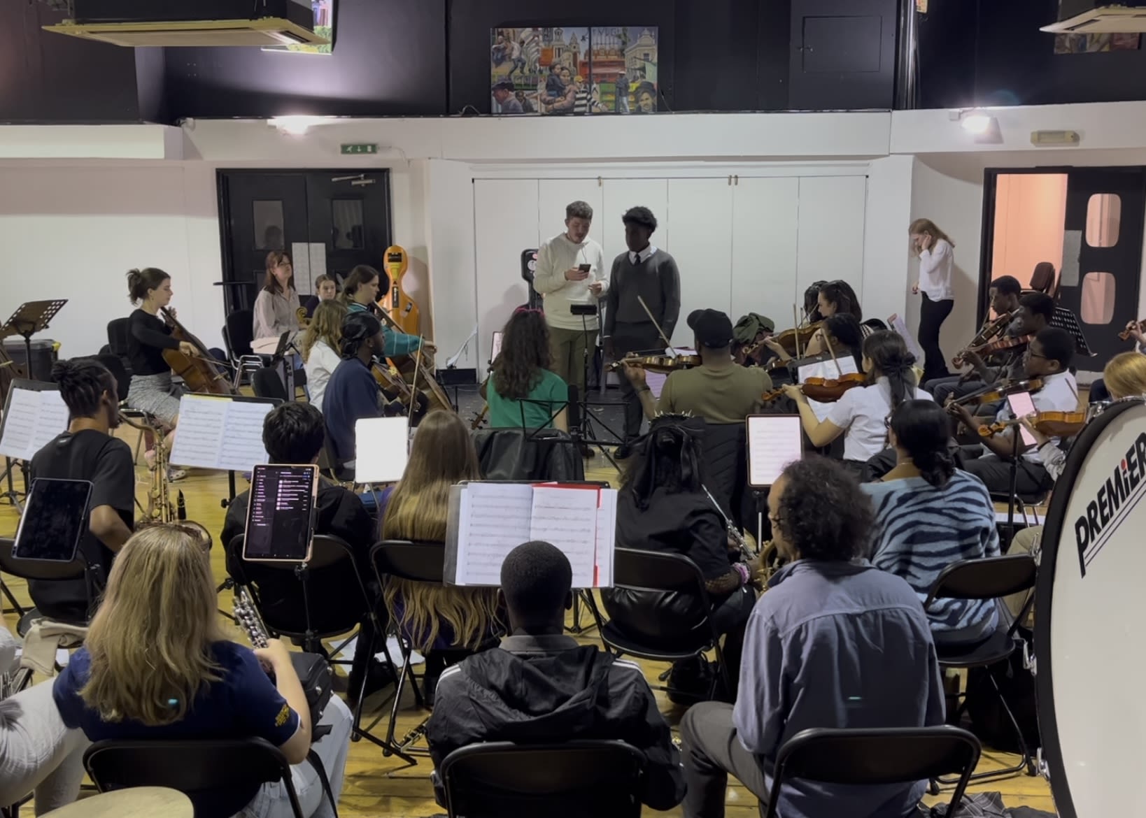 Matthew O'Keeffe rehearsing with secondary school student, Lionel, and the BCO at St Matthew's Church, Brixton. (Picture credit: Charlotte Wilson)